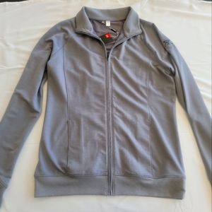 Women's Under Armour Golf zip up jacket with logo size Large New With Tags